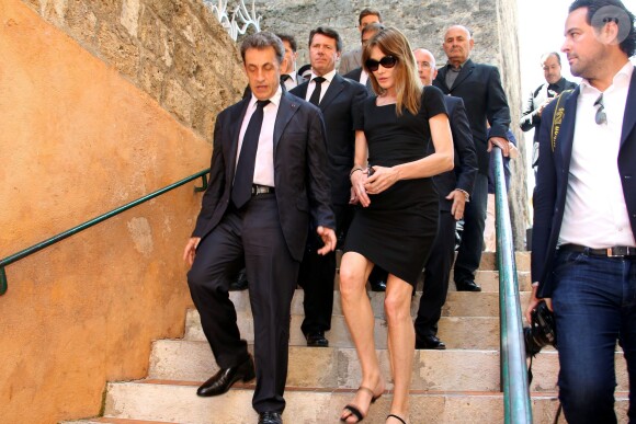 Nicolas Sarkozy et son épouse Carla Bruni-Sarkozy lors des obsèques de Charles Pasqua en la cathédrale Notre-Dame du Puy à Grasse, le 7 juillet 2015