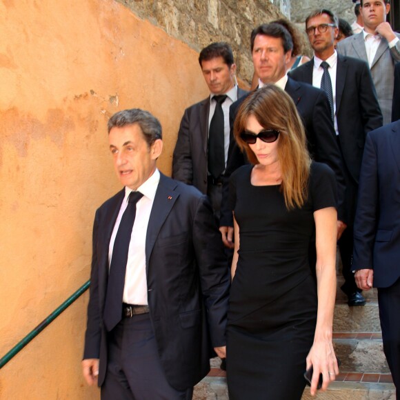Nicolas Sarkozy et son épouse Carla Bruni-Sarkozy lors des obsèques de Charles Pasqua en la cathédrale Notre-Dame du Puy à Grasse, le 7 juillet 2015