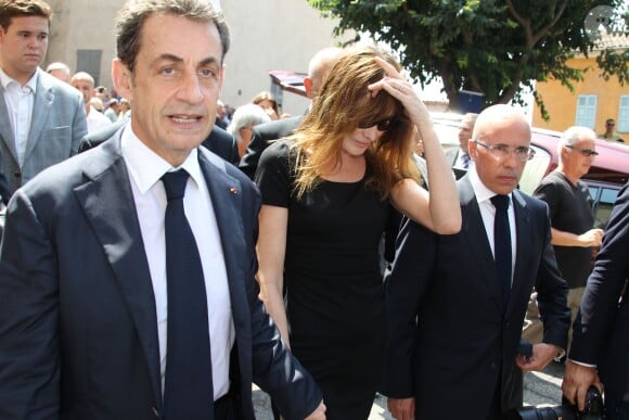 Nicolas Sarkozy, sa femme Carla Bruni-Sarkozy et Eric Ciotti lors des obsèques de Charles Pasqua en la cathédrale Notre-Dame du Puy à Grasse, le 7 juillet 2015
