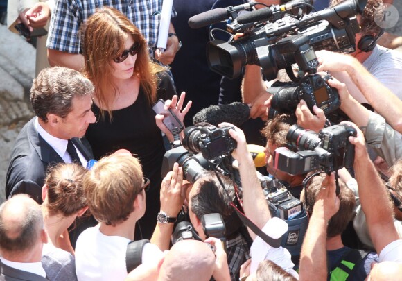 Nicolas Sarkozy et sa femme Carla Bruni-Sarkozy lors des obsèques de Charles Pasqua en la cathédrale Notre-Dame du Puy à Grasse, le 7 juillet 2015