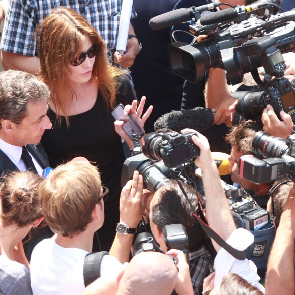 Nicolas Sarkozy et sa femme Carla Bruni-Sarkozy lors des obsèques de Charles Pasqua en la cathédrale Notre-Dame du Puy à Grasse, le 7 juillet 2015