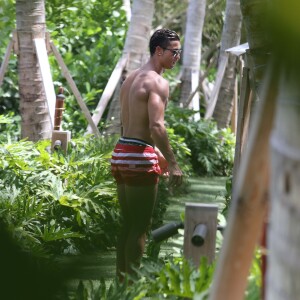 Cristiano Ronaldo et son fils Cristiano Jr en vacances à Miami le 24 juin 2015