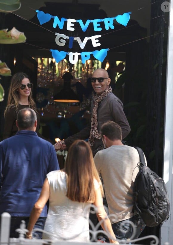 Exclusif : Atteint d'un cancer, Christian Audigier, le styliste français made in Hollywood quitte l'hôpital Cedar Sinaï avec sa femme Nathalie Sorensen (épousé en mars 2015) à Los Angeles le 6 avril 2015. Le célèbre couturier français a été diagnostiqué avec un trouble sanguin rare appelée syndrome myélodysplasique et désigne également la dysmyélopoïèse correspondant à une anomalie de la moelle osseuse. Le célèbre couturier, qui a subit une greffe de moelle osseuse, suit maintenant des séances de chimiothérapie à domicile. Actuellement Christian filme un projet documentaire de son cheminement vers le rétablissement.