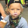 Axl le fils de Josh Duhamel le visage barbouillé de glace / juillet 2015