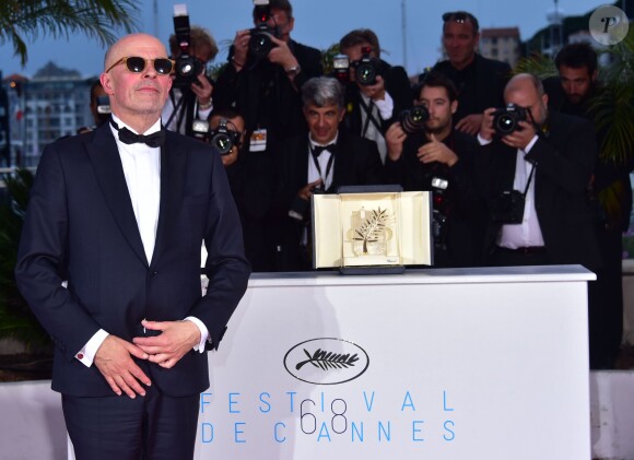 Jacques Audiard (Palme d'Or pour le film "Dheepan") - Photocall de la remise des palmes du 68e Festival du film de Cannes,  le 24 mai 2014. 