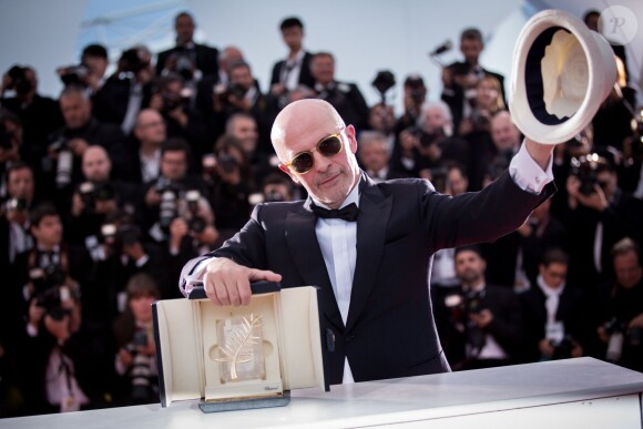 Jacques Audiard (Palme d'Or pour le film "Dheepan") - Photocall de la remise des palmes du 68e Festival du film de Cannes, le 24 mai 2014. 