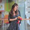Kate Middleton le 18 mars 2015 parfaite dasn sa robe signée Asos dont elle a provoqué les ruptures de stock