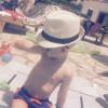Amélie Neten a posté quelques photos de vacances de son petit Hugo, sur Twitter, fin juillet 2015.