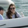 Kate Middleton, duchesse de Cambridge, à Auckland le 11 avril 2014 lors d'une course nautique dans le cadre de sa tournée officielle en Nouvelle-Zélande avec le prince William.