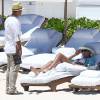 Exclusif - Prix Spécial - No web - No blog - Jessica Alba et son mari Cash Warren en vacances sur la plage à Cancun, Mexico, le 15 août 2015.  Exclusive - For Germany Call For Price - No web - No blog - Jessica Alba and husband Cash Warren enjoy a day on the beach with other family members in Cancun, Mexico on August 15, 2015. Jessica was showing off her toned bikini body in a tiny white bikini.15/08/2015 - Cancun