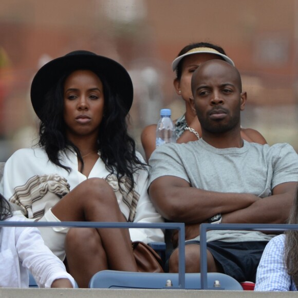 Kelly Rowland et Tim Witherspoon sur le court Athur Ashe à l'USTA Billie Jean King National Tennis Center de New York lors de l'US Open, le 2 septembre 2015