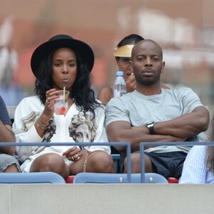 Kelly Rowland et Tim Witherspoon sur le court Athur Ashe à l'USTA Billie Jean King National Tennis Center de New York lors de l'US Open, le 2 septembre 2015