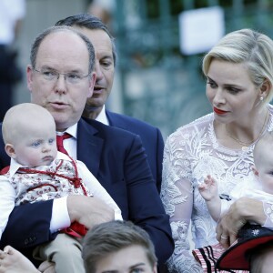 2015/Le prince Albert de Monaco et la princesse Charlène, accompagnés de leurs enfants le prince Jacques et la princesse Gabriella, habillés en costume traditionnel, au pique-nique de la Principauté, qui se tient chaque année au parc de la princesse Antoinette le 28 août 2015.