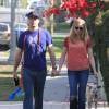 Jon Hamm et sa femme Jennifer Westfeldt se promènent avec leur chien Cora à Los Feliz, le 23 janvier 2014.