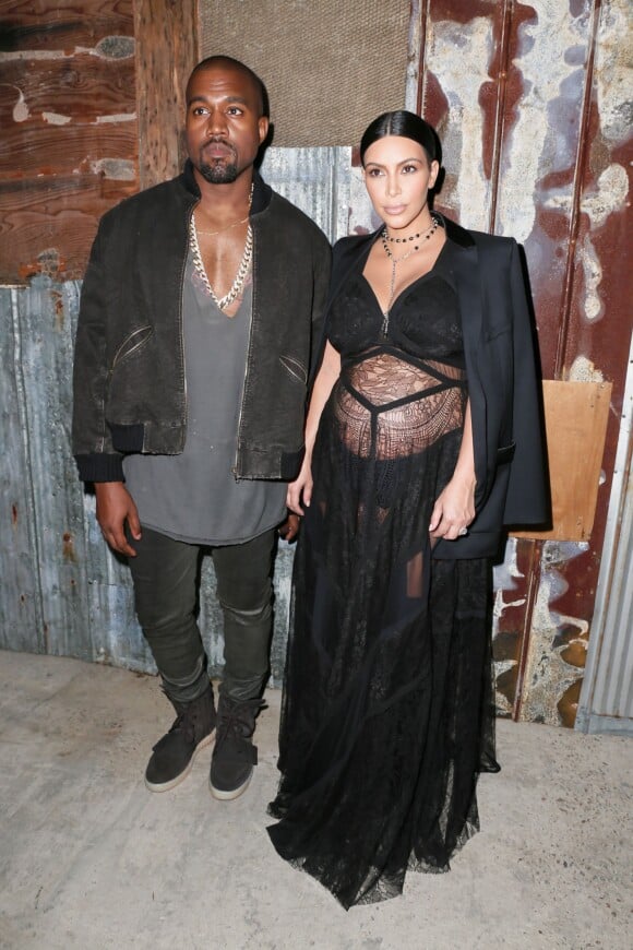 Kanye West et Kim Kardashian assistent au défilé Givenchy printemps-été 2016 au Pier 36. New York, le 11 septembre 2015.