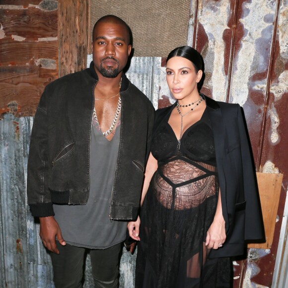 Kanye West et Kim Kardashian assistent au défilé Givenchy printemps-été 2016 au Pier 36. New York, le 11 septembre 2015.