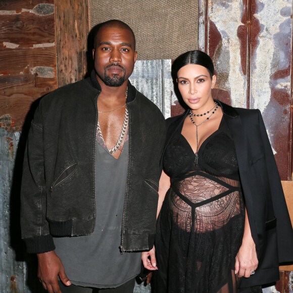 Kanye West et Kim Kardashian assistent au défilé Givenchy printemps-été 2016 au Pier 36. New York, le 11 septembre 2015.