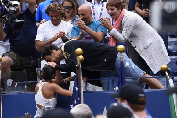 Flavia Pennetta et son compagon Fabio Fognini après sa finale victorieuse de l'US Open à l'USTA Billie Jean King National Tennis Center de Flushing dans le Queens à New York, le 12 septembre 2015