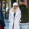 Kesha rentre à son hôtel puis ressort avec une tenue différente à New York, le 16 février 2015.