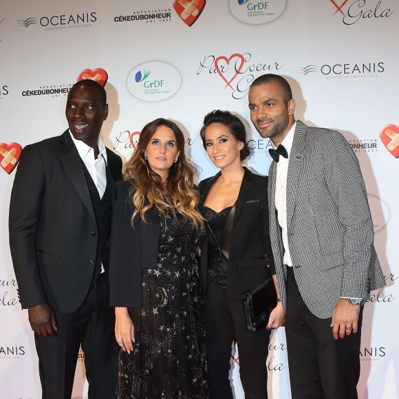 Omar Sy et sa femme Hélène, Tony Parker et sa femme Axelle Francine au "Par Coeur Gala" à l'occasion des 10 ans de l'association "Cekedubonheur" au pavillon d'Armenonville à Paris le 24 septembre 2015