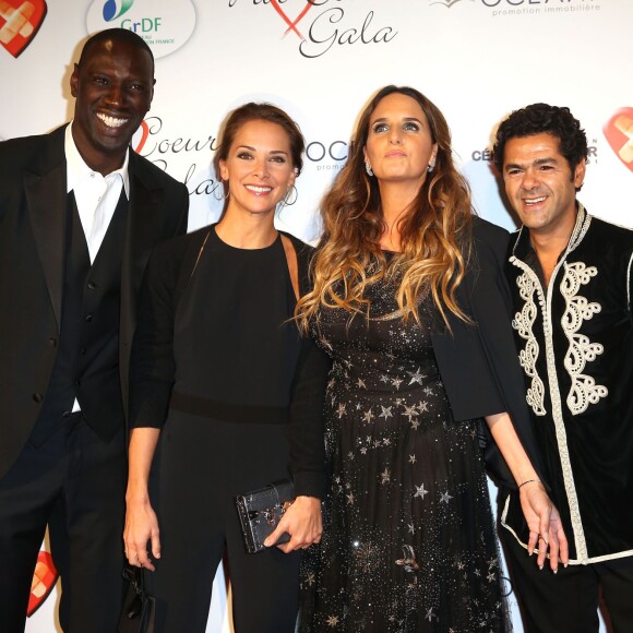 Omar Sy, Mélissa Theuriau, Hélène Sy et Jamel Debbouze au "Par Coeur Gala" à l'occasion des 10 ans de l'association "Cekedubonheur" au pavillon d'Armenonville à Paris le 24 septembre 2015