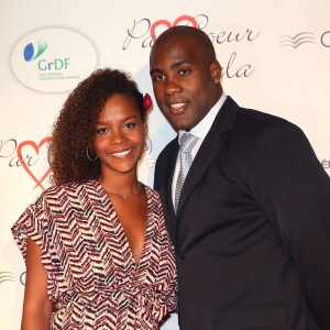 Teddy Riner et sa compagne Luthna au "Par Coeur Gala" à l'occasion des 10 ans de l'association "Cekedubonheur" au pavillon d'Armenonville à Paris le 24 septembre 2015