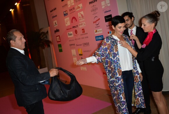 Cristina Cordula peut compter sur son compagnon lors de la soirée de lancement d'Octobre Rose (le mois de lutte contre le cancer du sein) au Palais Chaillot à Paris le 28 septembre 2015