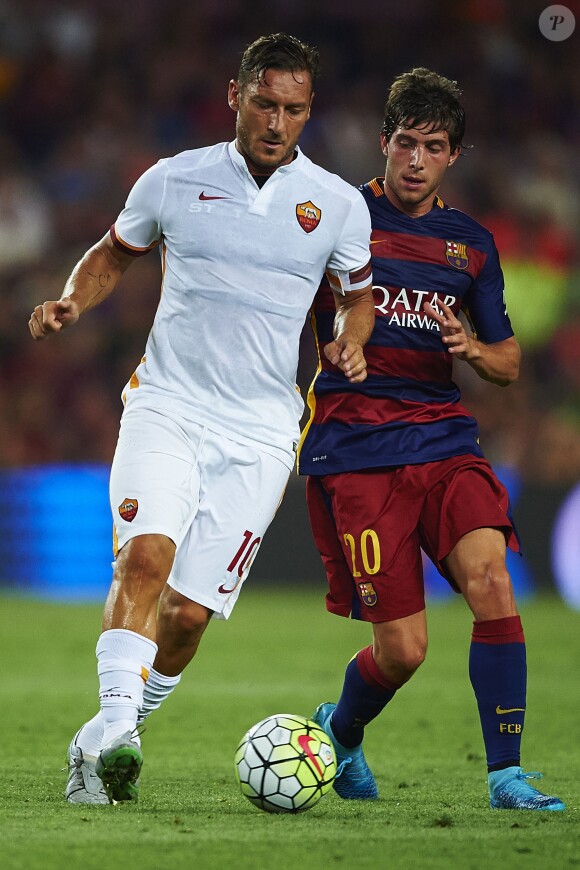 Totti et Sergi Roberto à Barcelone le 5 août 2015.