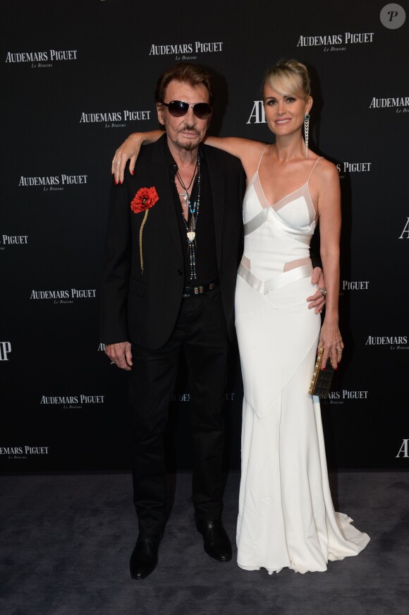 Exclusif - Johnny Hallyday et sa femme Laeticia Hallyday - La maison Audemars Piguet a célébré le lancement de la nouvelle Millenary Femme au Carreau du Temple à Paris le 6 juillet 2015 .