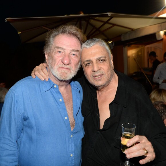 Exclusif - Eddy Mitchell et Enrico Macias - Soirée Marcel Campion à la plage La Bouillabaisse à Saint-Tropez, le 5 août 2015.