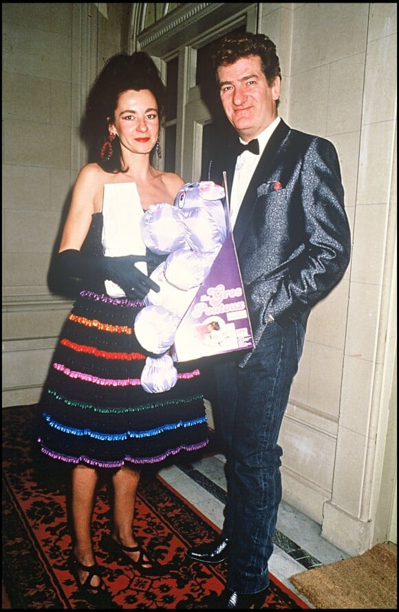 Eddy Mitchell et son épouse Muriel lors d'une soirée organisée par Eddy Barclay, le 21 janvier 1988. 