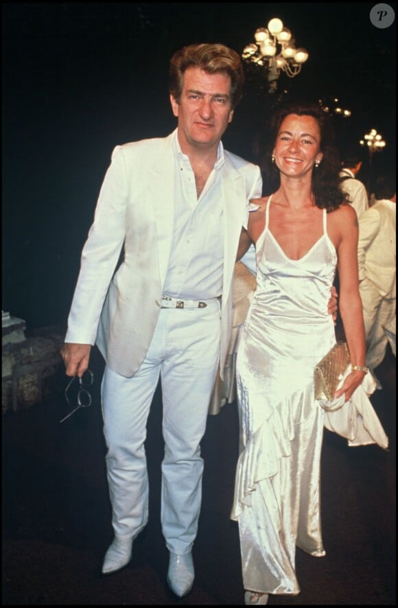 Eddy Mitchell et son épouse Muriel au mariage d'Eddiy Barclay et Caroline le 3 juin 1988. 