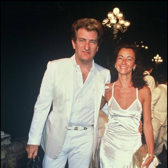 Eddy Mitchell et son épouse Muriel au mariage d'Eddiy Barclay et Caroline le 3 juin 1988. 