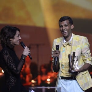 Virginie Guilhaume (habillée en Zuhair Murad) et Stromae (Artiste interprète masculin, album de chansons et vidéo-clip) - 29ème édition des Victoires de la Musique à Paris. Le 14 février 2014  29 th Victoires de la musique, French Music Awards in Paris on 14/02/201414/02/2014 - Paris