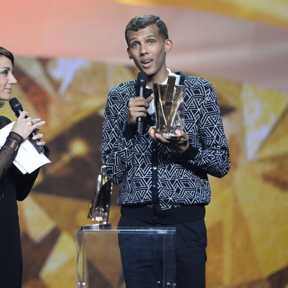 Virginie Guilhaume (habillée en Zuhair Murad) et Stromae (Artiste interprète masculin, album de chansons et vidéo-clip) - 29ème édition des Victoires de la Musique à Paris. Le 14 février 2014  29 th Victoires de la musique, French Music Awards in Paris on 14/02/201414/02/2014 - Paris
