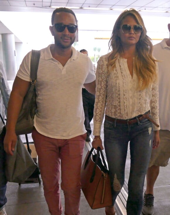 John Legend et sa femme Chrissy Teigen passent la journée à Miami, le 9 août 2015.