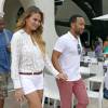 John Legend et sa femme Chrissy Teigen passent la journée à Miami, le 9 août 2015. Le couple a dîné au restaurant Prime Fish avant d'aller prendre prendre un avion à l'aéroport.