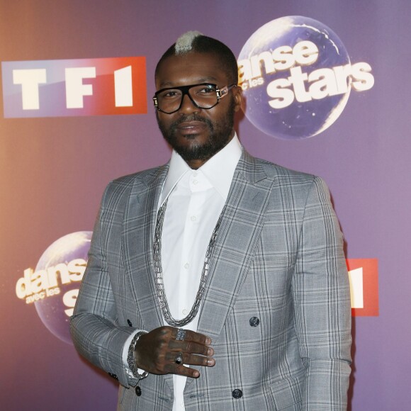 Djibril Cissé lors du photocall de Danse avec les stars 6 devant TF1 à Boulogne-Billancourt, le 7 octobre 2015