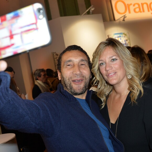 Zinedine Soualem et sa compagne Caroline Faindt - Soirée d'inauguration de la Fiac 2015 organisée par Orange au Grand Palais à Paris, le 21 octobre 2015.