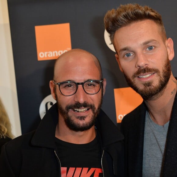 M. Pokora et Cartman - Soirée d'inauguration de la Fiac 2015 organisée par Orange au Grand Palais à Paris, le 21 octobre 2015.