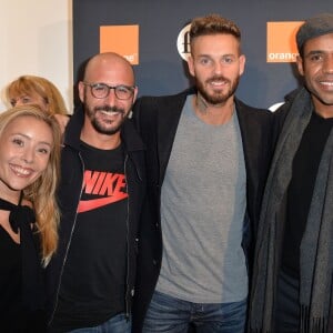 Cartman et sa femme Aurélia Crebessegues, M. Pokora et Loup-Denis Elion - Soirée d'inauguration de la Fiac 2015 organisée par Orange au Grand Palais à Paris, le 21 octobre 2015.