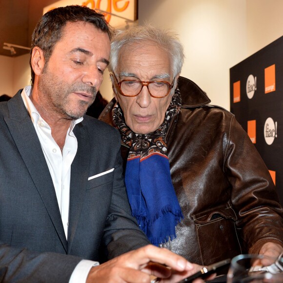 Gérard Darmon et Bernard Montiel - Soirée d'inauguration de la Fiac 2015 organisée par Orange au Grand Palais à Paris, le 21 octobre 2015. ©Veeren/Bestimage