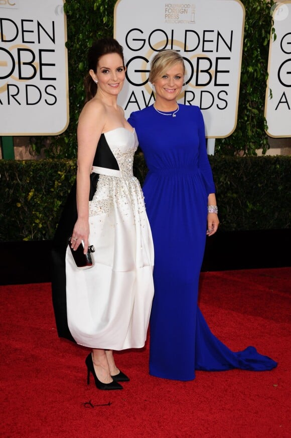 Tina Fey, Amy Poehler (robe Stella McCartney) - La 72ème cérémonie annuelle des Golden Globe Awards à Beverly Hills, le 11 janvier 2015.