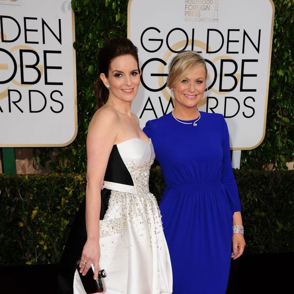 Tina Fey, Amy Poehler (robe Stella McCartney) - La 72ème cérémonie annuelle des Golden Globe Awards à Beverly Hills, le 11 janvier 2015.