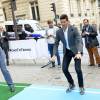 Novak Djokovic lors de l'événement "RoadToTennis" sur les Champs-Elysées à Paris, le 2 novembre 2015 © Veeren