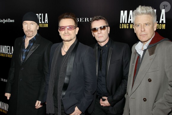 The Edge, Bono, Larry Mullen Jr. et Adam Clayton de U2 à New York, le 25 novembre 2013.