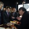 Le ministre de l'Économie et des Finances Emmanuel Macron assiste au vernissage de l'exposition "Volez, Voguez, Voyagez - Louis Vuitton" au Grand Palais. Paris, le 3 décembre 2015.
