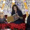Michelle Obama et Miss Piggy lisent un livre pour enfants lors de la cérémonie d'illumination du sapin de Noël de la Maison Blanche. Washington, le 3 décembre 2015.