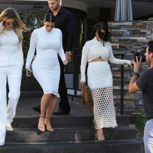 Khloé, Kim et Kourtney Kardashian à Westlake Village, le 7 juillet 2015.