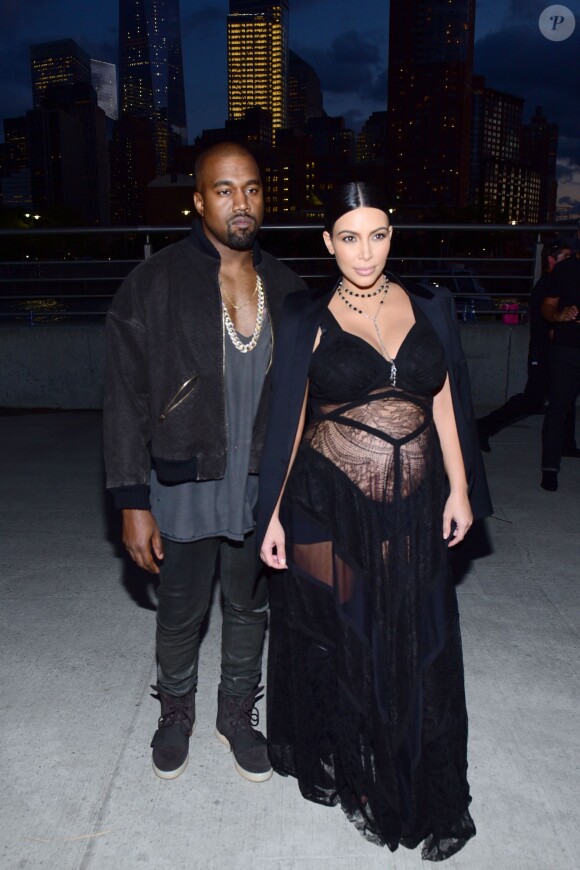 Kanye West et Kim Kardashian au défilé Givenchy (collection printemps-été 2016) à New York, le 11 septembre 2015.